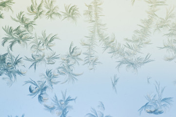 Frosty patterns on glass. Winter background. - 133803944