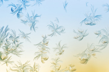 Fototapeta na wymiar Frosty patterns on glass. Winter background.