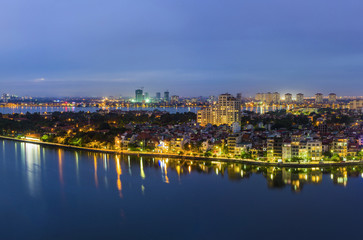 Fototapeta na wymiar Aerial view of Hanoi skyline at West Lake ( Ho Tay in Vietnamese), at twilight