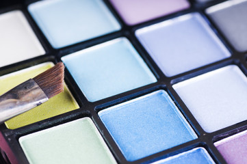 Bright palette of eyeshadows and brush