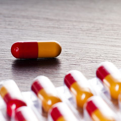 colorful drugs and pills on the table