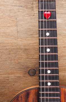 Valentines Day background with hearts on vintage guitar