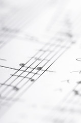 Handwritten musical notes, shallow DOF