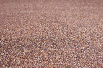 Fototapeta na wymiar Texture of volcanic sand