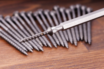 screwdriver and screws on the table