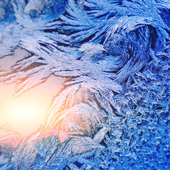 Frosty winter background photo of ice buildup on a window