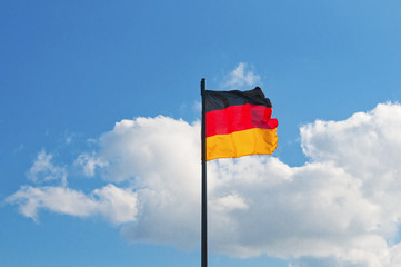 German flag on a background of the sky