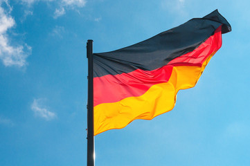 German flag on a background of the sky