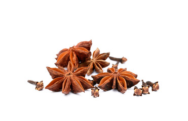 Aromatic star anise and cloves isolated on white background