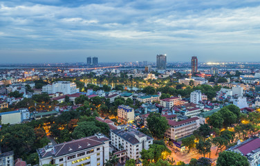 Fototapeta na wymiar Aerial view of Hanoi cityscape at twilight. Viewing from Ly Thuong Kiet street, south of Hoan Kiem lake