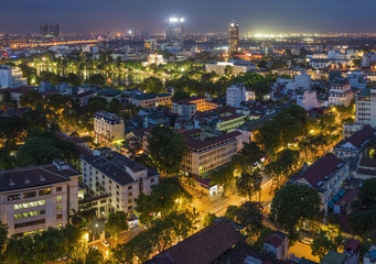 Fototapeta premium Aerial view of Hanoi cityscape at twilight. Viewing from Ly Thuong Kiet street, south of Hoan Kiem lake