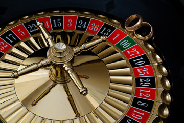Wedding gold rings on the roulette wheel