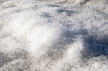 Obraz premium Snow with ice like a glass and crystal in early spring