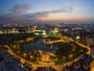 Fototapeta na wymiar Hanoi cityscape at twilight. Cau Giay park aerial view