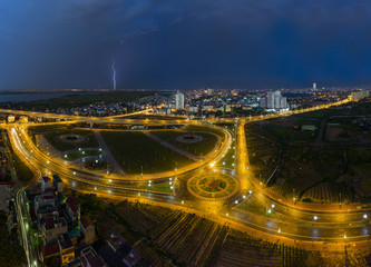 Fototapeta na wymiar Aerial view of skyline city at twilight. Hanoi cityscape at Nhat Tan bridge