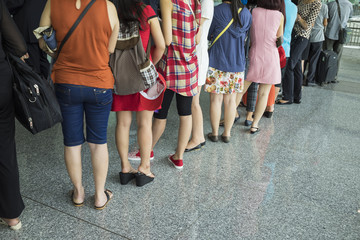 Fototapeta na wymiar Line of airline Asian passenger waiting at boarding gate