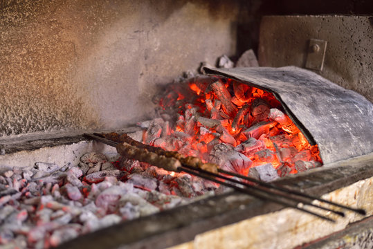 A Special shish kebab which name is K&uuml;şleme on wood fire barbecu in a famous local kebab restaurant in Gaziantep, Turkey