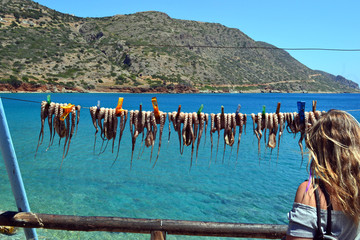 The process of drying octopuses in the Mediterranean.