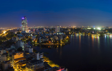 Fototapeta na wymiar Hanoi skyline cityscape at twilight period. West Lake aerial view