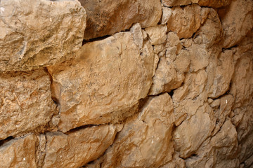 Greek letters on old stones of Acrocorinth (the acropolis of ancient Corinth)