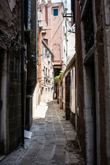 Fototapeta na wymiar Historic narrow street of Venice, second