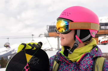 Snowboarder girl at Arhiz, Caucasian mountain.