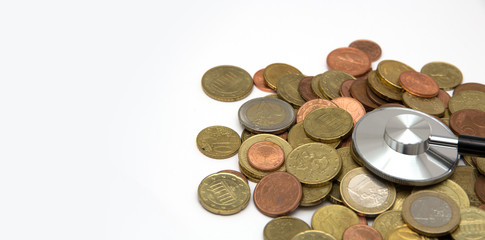 euro coins isolated with stethoscope