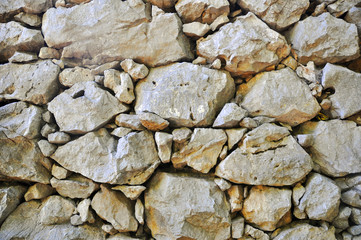 Stone Rock Wall. Texture of old rock wall for background.