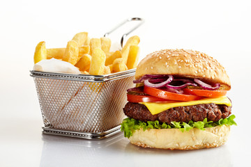 Cheeseburger with basket of French fries