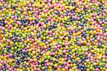 Multicoloured sweet sugar balls. Small ball pattern.