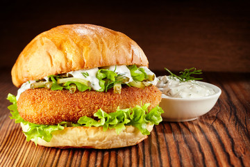 Chicken burger with lettuce and mayonnaise dip