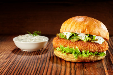Chicken burger with lettuce and mayonnaise dip