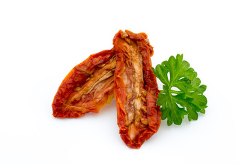 Dried tomatoes isolated on white background.