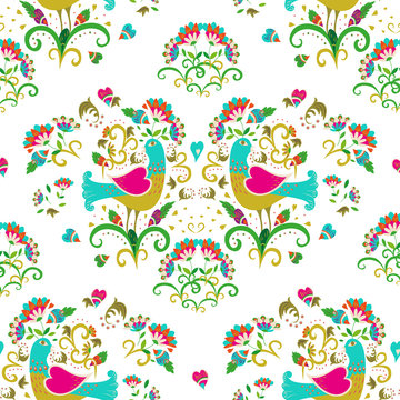 Ethnic colorful and ornate birds and flowers pattern. Seamless pattern on white background for embroidery and textile.