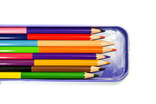 Colorful crayon, color pencil in blue box