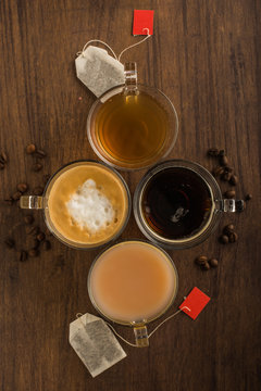 Cups with tea and coffee