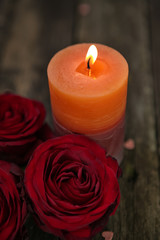 Fototapeta na wymiar Valentines Day background red rose with candle.