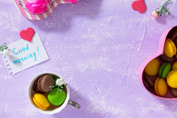 Breakfast, Mother's Day, birthday background. Mug cakes Macaron,