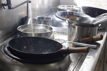 Close up of working chef preparing chinese food