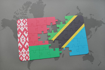 Fototapeta na wymiar puzzle with the national flag of belarus and tanzania on a world map