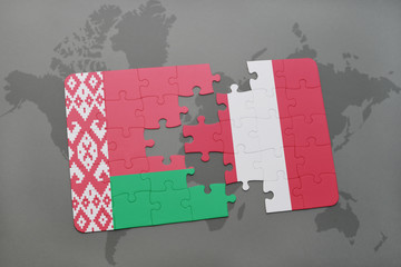Fototapeta na wymiar puzzle with the national flag of belarus and peru on a world map