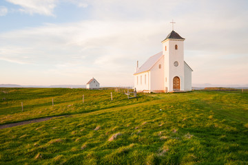 Church on the island Flatey Iceland at midnight in june