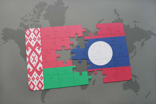 puzzle with the national flag of belarus and laos on a world map
