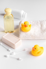 Fototapeta na wymiar baby organic cosmetic for bath on white bakground