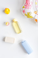 baby accessories for bath with duck on white background