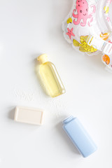 baby organic cosmetic for bath on white bakground top view