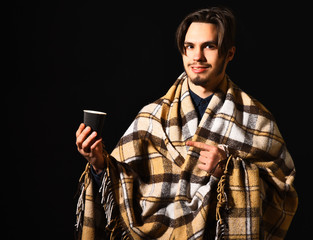 smiling bearded man in plaid