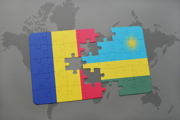 puzzle with the national flag of romania and rwanda on a world map