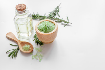organic cosmetics with extracts of herbs rosemary on white background