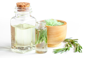 organic cosmetics with extracts of herbs rosemary on white background